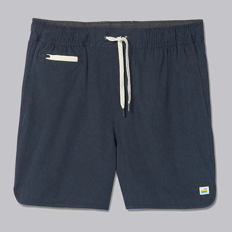 Vuori Men's Banks Shorts - 5 inch Inseam, navy blue athletic shorts with elastic waistband, drawstring, and zippered pocket.