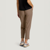 Free Fly Apparel Free Fly Women's Breeze Drift Pant, beige lightweight, relaxed fit casual pants worn by a female model
