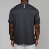 Rhoback Men's Tailwind Performance Tee, back view of a man wearing a dark gray athletic T-shirt with a vertical stripe detail at the upper back.