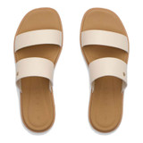 Reef Women's Sunny Alisah Sandal, white slip-on sandal with two wide straps over the foot and cushioned tan footbed.