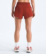 The North Face Women's Summit Pacesetter 3in Short, red athletic running shorts with a high waistband and reflective accents.