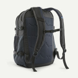 Patagonia Refugio Day Pack 30L, black tactical backpack with padded shoulder straps and adjustable chest strap.