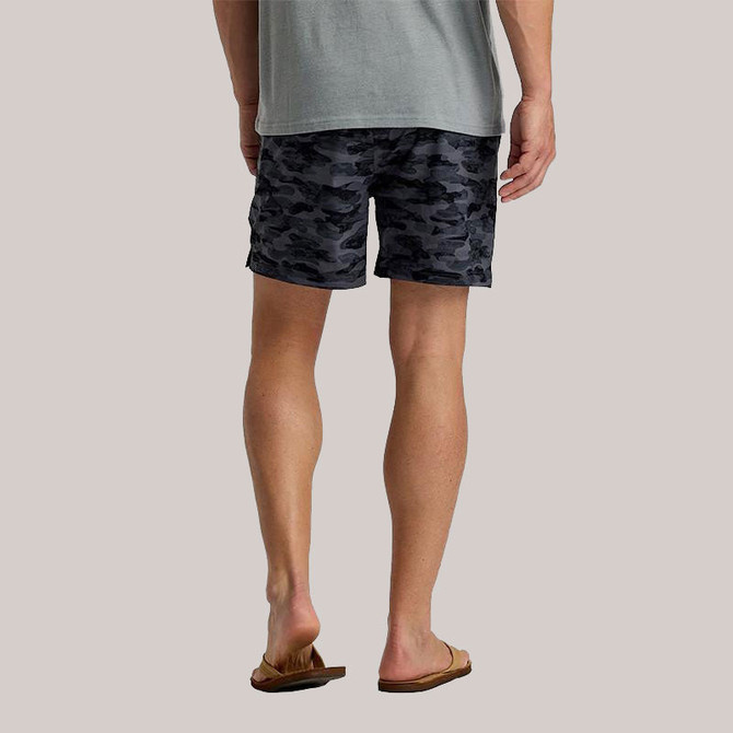 Free Fly Apparel Free Fly Men's Lined Active Breeze Shorts - 5.5" Inseam, men's athletic shorts with a black and grey camouflage pattern, worn by a male model with a grey t-shirt, shown from the back.