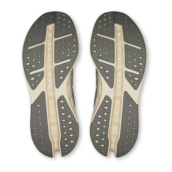 On Men's Cloudsurfer Max Running Shoes, view of the soles showing the textured grip and supportive sole design.