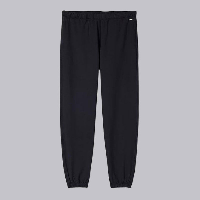 Vuori Women's Halo Modern Sweatpant, black athletic joggers with elastic waistband and cuffs.