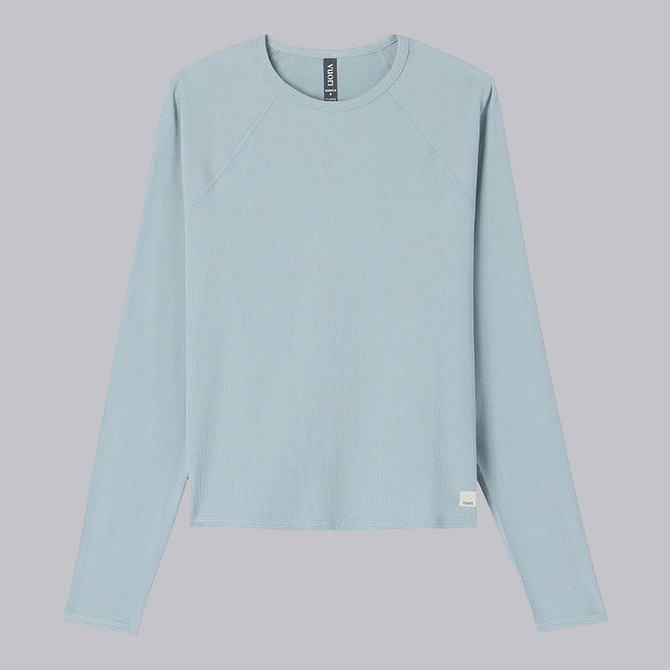 Vuori Women's Long Sleeve Pose Crew, light blue athletic long sleeve shirt with a crew neckline and textured fabric for activewear.