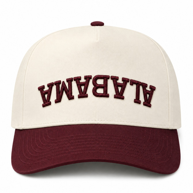 Alabama Outdoors Captuer Upside Down Alabama Logo Snapback, a beige and maroon baseball cap with embroidered upside-down 'ALABAMA' lettering and a curved maroon brim.