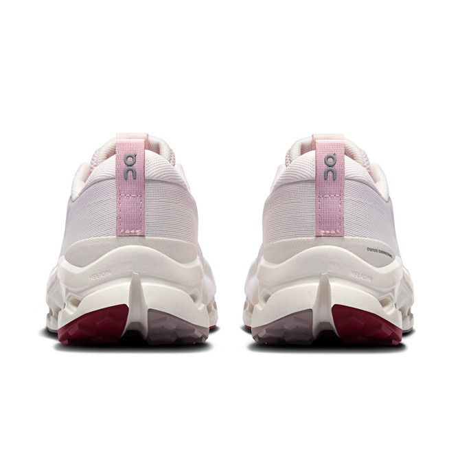 On Running Women's Cloudsurfer Trail 2, rear view of light pink athletic trail running shoes with white soles and pink accent on heel