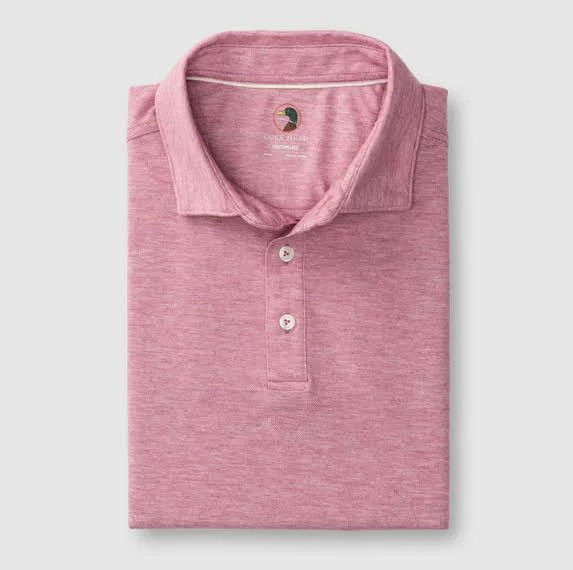 Duck Head Men's Short Sleeve Summerford Performance Jersey Polo, folded pink polo shirt with a collar and three buttons.