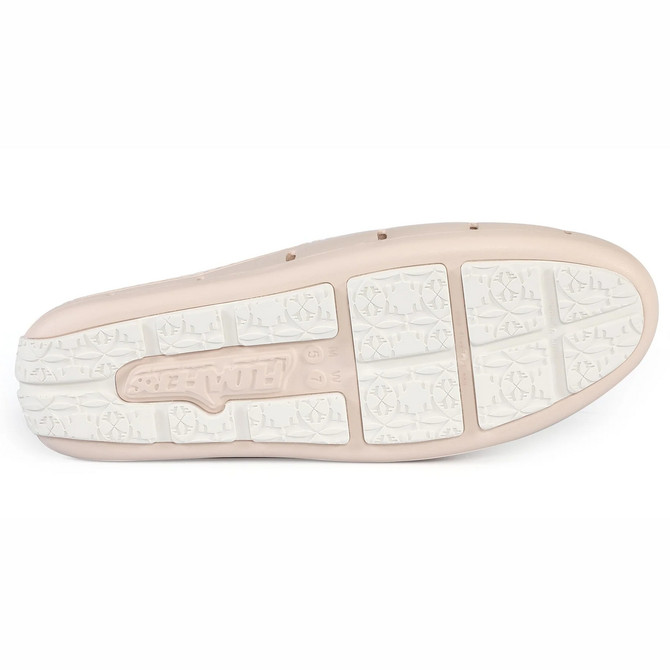 Floafers Sunset Slide 6, view of the sole showing white textured grip pattern and light pink midsole with brand logo