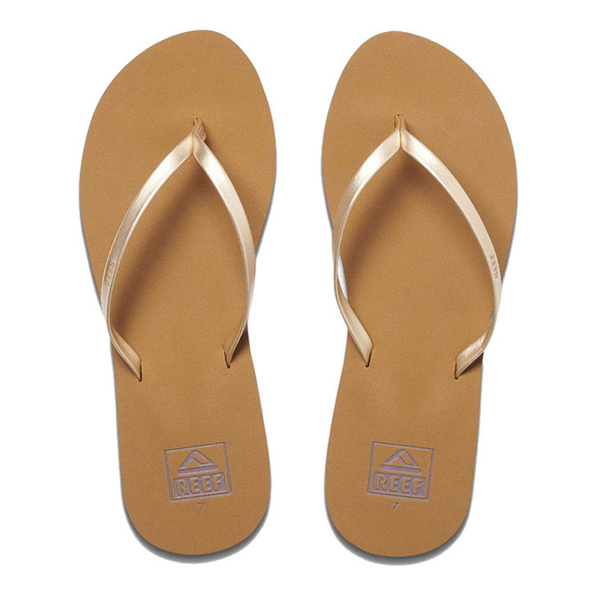 Reef Women's Bliss Nights Flip Flop, tan and gold flip flops with rubber straps and cushioned soles.