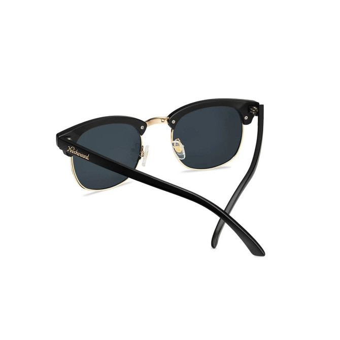 Knockaround Brooklines Sunglasses, stylish black and gold sunglasses with dark tinted lenses and brand logo on the temple.