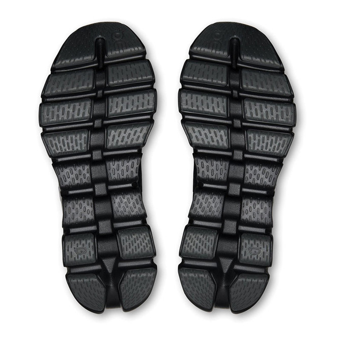 On Running Women's Cloud X 5, black athletic shoe soles with a segmented design for flexibility and support.