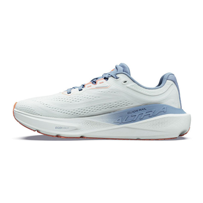 Altra Women's Torin ST, athletic running shoe with a white and light blue design featuring cushioned sole and lace-up closure for comfortable running performance.