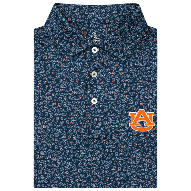 Rhoback Men's Auburn Let's Roll Performance Polo, folded navy performance polo with an allover white and orange football-themed print, three-button placket, and embroidered orange Auburn logo.