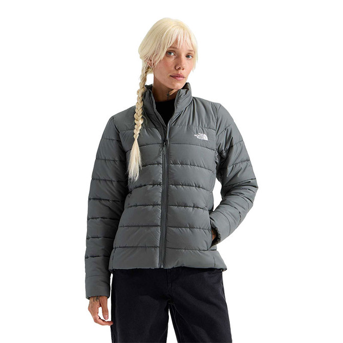 The North Face Women's Aconcagua Jacket, a lightweight insulated outdoor jacket in gray with a zip-up front and high collar.