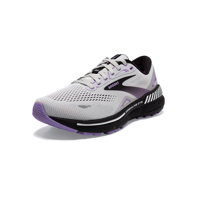 Brooks Running Women's Adrenaline Gts 23, a white and purple running shoe with mesh upper and cushioned sole designed for comfort and support.
