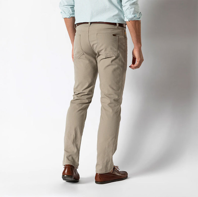 Duck Head Men's Pinpoint Canvas 5-Pocket Pants - 32" Inseam, beige casual men's trousers with classic 5-pocket design, worn with a light blue shirt and brown shoes.