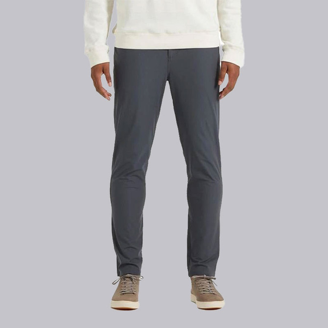 Vuori Men's Meta Pant, product image showing gray athletic jogging pants worn by a person.