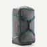 Patagonia Black Hole Wheeled Duffel 70L, gray travel duffel bag with teal straps and Zippers, with wheels and carrying handle.