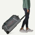 Patagonia Black Hole Wheeled Duffel 70L, a large grey travel duffel with wheels and an extendable handle, positioned against a plain background.