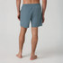 Vuori Men's Maverick Volley Short Lined, back view of men's lined sport shorts in blue color showing elastic waistband and relaxed fit.
