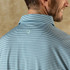 Duck Head Men's Short Sleeve Long Drive Performance Polo - Windor, close-up of the back of a man wearing a light blue and white striped golf polo shirt with a small logo on the back, showing the fabric and style details.
