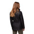 Barbour Women's Cavalry Polarquilt Jacket, a woman wearing a stylish black quilted jacket with a high collar and fitted waistband, viewed from the back.