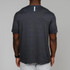 Rhoback Men's Tailwind Performance Tee, back view of a man wearing a dark gray athletic T-shirt with a vertical stripe detail at the upper back.