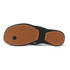 Reef Women's Water Willow Malibu Flip Flop, bottom view showing the black sole and brown rubber tread with textured pattern.