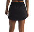 The North Face Women's Aphrodite Arise Skort, black athletic skort worn by a model showing the back view with an elastic waistband and skirt overlay.