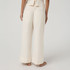 Vuori Women's Trestles Twill Crop Wideleg Pant, cream-colored wide-leg casual pants with a relaxed fit, front and back pockets, and a cropped length.