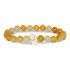 Fahlo The Swing Bracelet, beaded bracelet with alternating light and dark yellow beads and a white dinosaur charm.