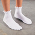 FP Movement Women's Classic Ruffle Sock, white ankle socks with ruffled trim at the top and ribbed knit design.
