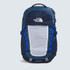 The North Face Recon backpack, blue and gray outdoor hiking bag with multiple compartments and adjustable straps.
