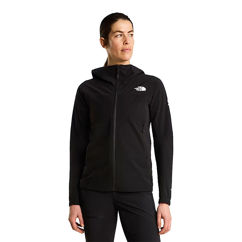 The North Face Women's Summit Off Width Jacket, a women's black outdoor performance jacket with a high collar, zipper closure, and The North Face logo on the chest, designed for mountain climbing or outdoor activities.