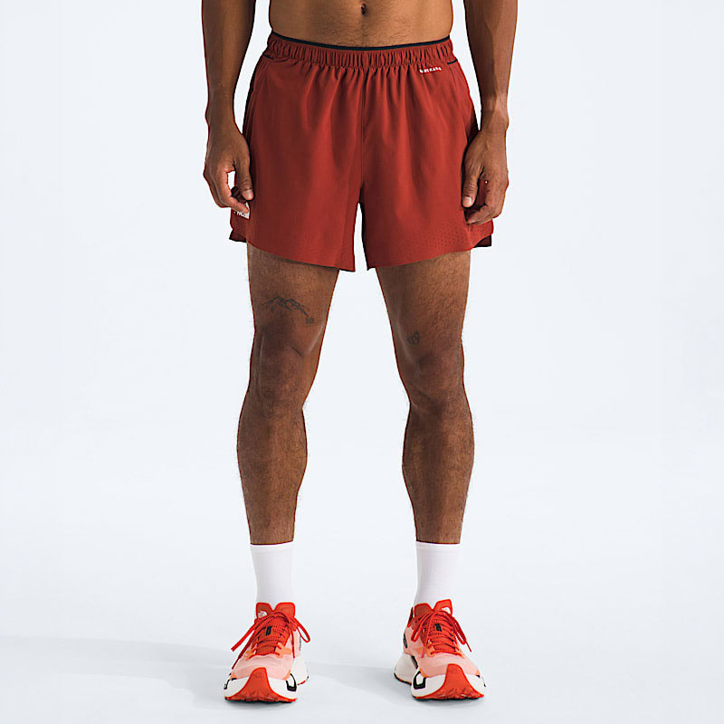 The North Face Men's Summit Pacesetter 5in Short, a pair of red athletic shorts worn by a male model.