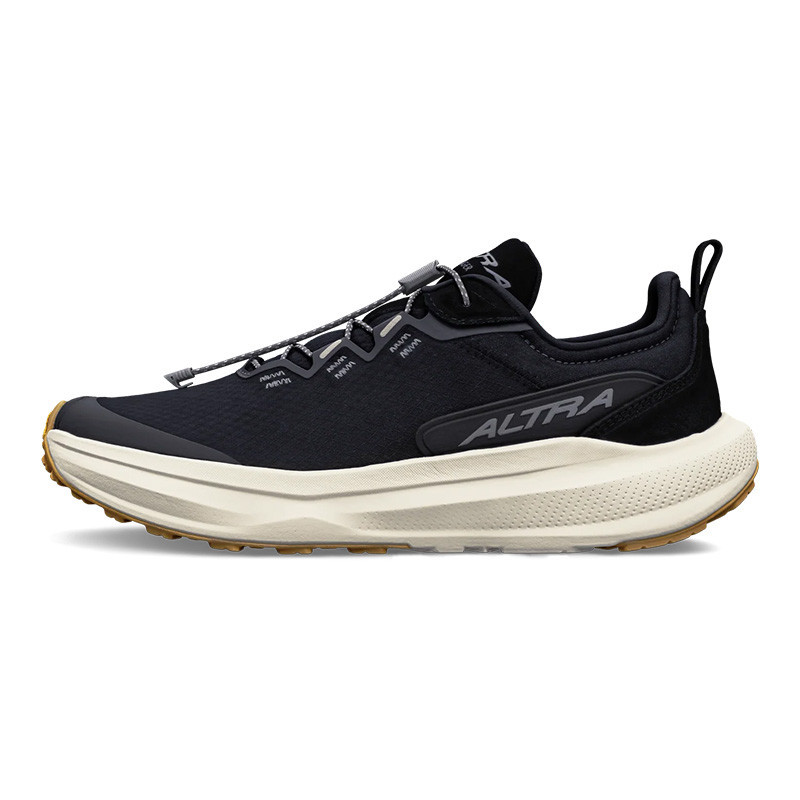 Altra Women's Voyager, black trail running shoe with cushioned white sole and lace-up design.
