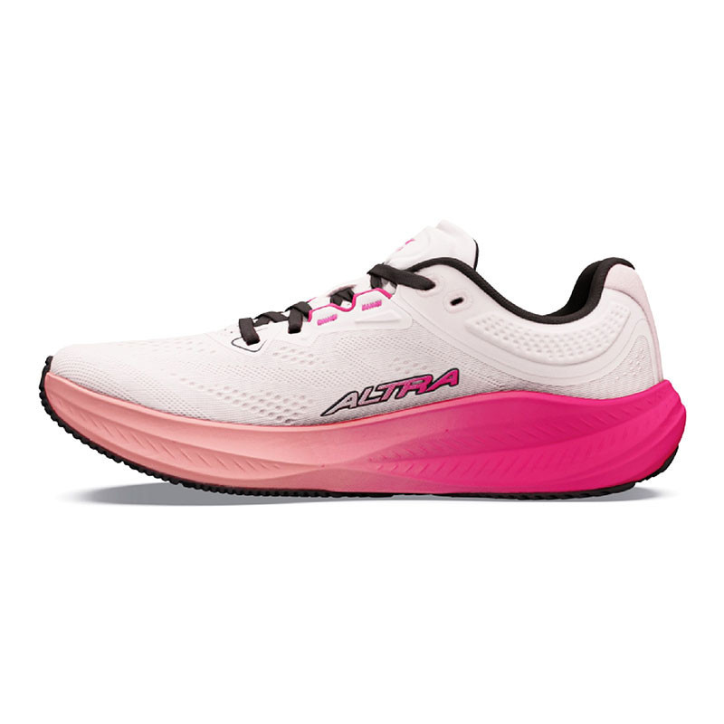 Altra Women's Torin 9, a white and pink running shoe with a cushioned sole and breathable upper fabric.