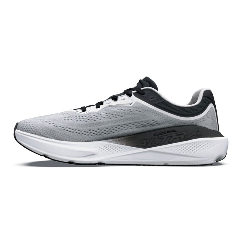 Altra Men's Torin ST, modern running shoe with breathable grey and black upper, cushioned white midsole, and durable outsole, designed for comfort and performance.