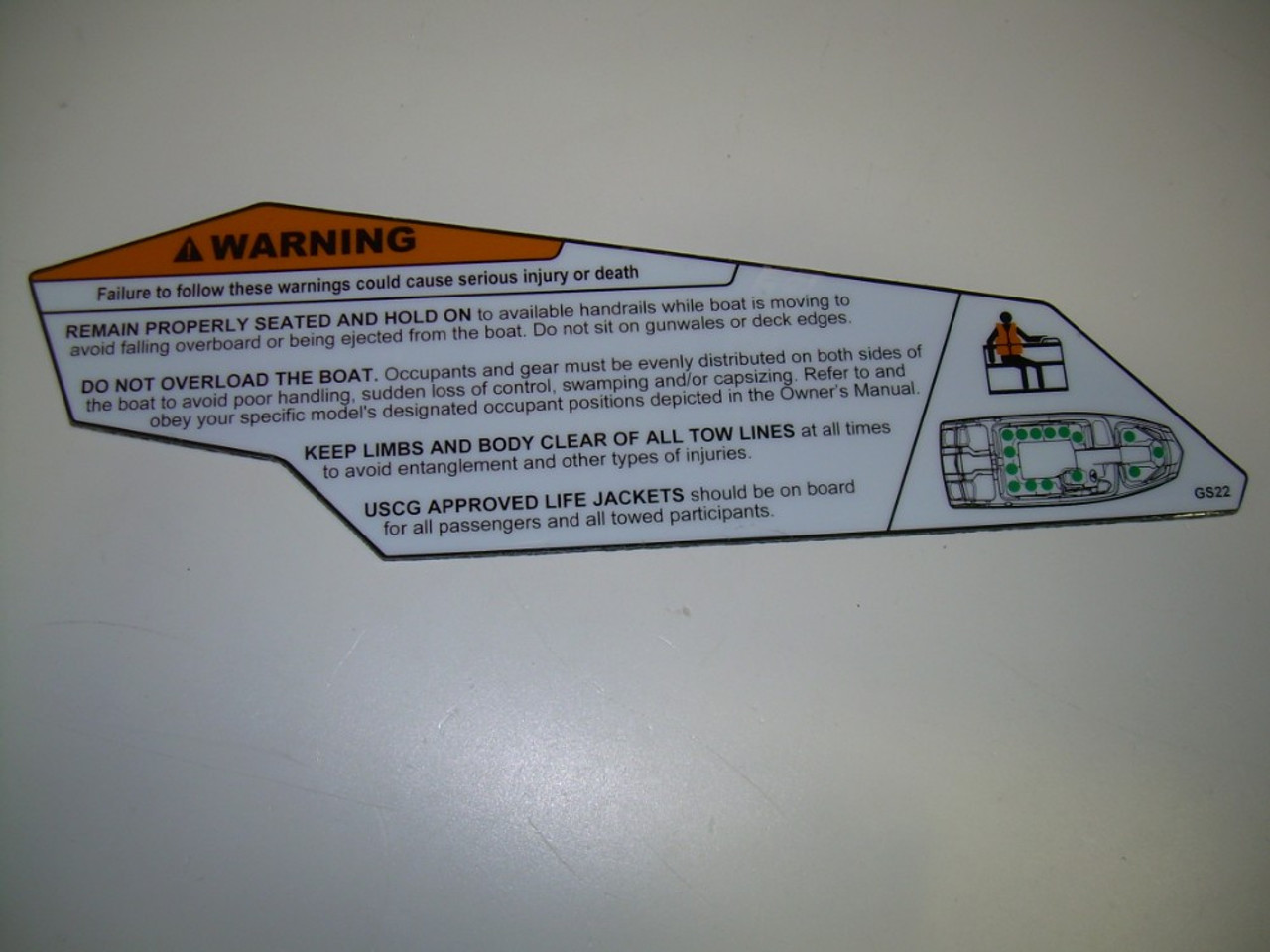 DECAL, WARNING PASSENGER COMPARTMENT SEATING GS22