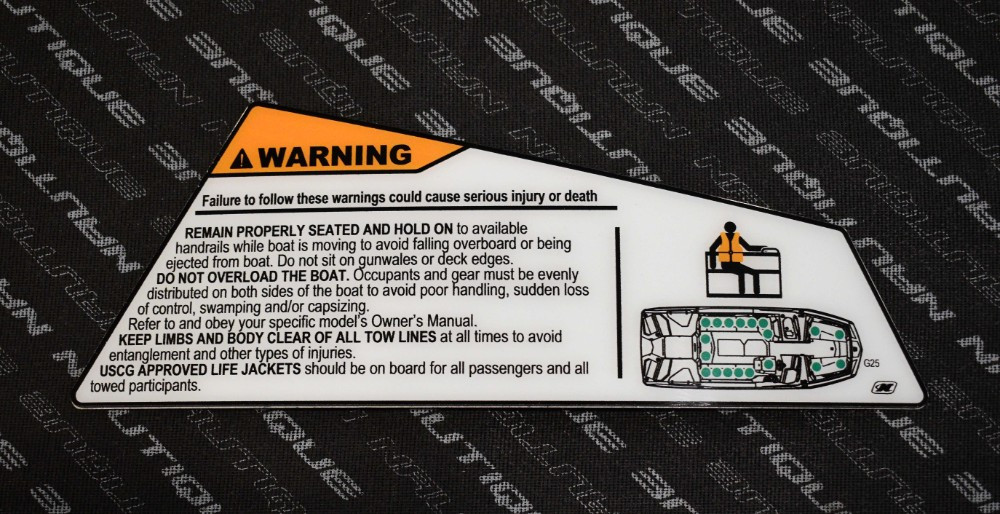 DECAL PASSENGER COMPARTMENT LABEL WARNING -- 2025