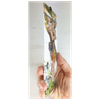 Close-up view showcasing the enchanting storybook-inspired details and the decorative tassel included with the bookmark.
