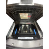 Top-down open view of the Datalogic Magellan 9800i bi-optic scanner scale showing its internal components, vertical scanner tower, and lower glass scan window.
