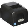 A side-angled perspective view of a Star Micronics TSP654IIBI2 thermal receipt printer in matte black.

The image shows the following external features:

Chassis: A sturdy, compact design with a hinged top cover for easy paper roll loading. The exit slot for printed receipts is located at the top front.

Controls and Indicators: A white control panel is recessed on the lower-right front face, featuring:

Power and Error LEDs: Clearly labeled indicator lights.

FEED Button: For manual paper advancement.

Power Switch: A black rocker-style power switch is located on the lower-left side near the base.

Branding: A blue and white Energy Star logo sticker is visible on the bottom-right corner of the front panel.

Connectivity Access: A small cutout at the bottom-rear corner allows for cable routing from the back interface panel.

The printer is photographed against a plain white background, emphasizing its functional and professional design for point-of-sale environments.