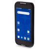 A studio product shot on a clean white background showcasing the black Datalogic Memor 11 mobile computer terminal from a three-quarter perspective. The device stands vertically, angled toward the left to highlight the sleek thickness and clean lines of its right-side profile casing. The illuminated 5-inch display features an active Android interface with a blue home wallpaper, a Google search bar, and various app shortcuts. A white "DATALOGIC" logo is visible on the top bezel, and "memor 11" is embossed on the bottom chin.