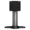 An Elo rear-facing customer display pole mount kit (model E038989), photographed from a straight, front-facing perspective against a solid white background.

The assembly stands vertically, featuring a square black VESA mounting interface plate at the top with pre-drilled mounting holes. This plate is supported by a thick, cylindrical silver metal neck pole. The bottom of the pole is anchored into a wide, flared black mounting base structure designed to interface with an X-Series system stand.