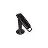 The file ens-flexipole-complete-counter-mount-quick-release-stand-ass30121-side.jpg displays a three-quarter studio shot of a black ENS FlexiPole payment terminal counter stand, isolated against a solid white background.

The standalone hardware consists of a vertical metal mounting pole supported by a flared circular base flange, which features a small red and white branding oval near the front edge. Fixed to the pivoting hinge at the top of the pole is an elongated, rectangular composite mounting plate tilted backward at an angle. The open-faced mounting plate shows a recessed pattern of screw cutouts, slots, and central guide tracks designed to lock an adjustable terminal adapter plate securely into place, complete with an open D-shaped handle loop molded into its bottom edge for easy tilt manipulation.