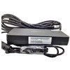 Side profile of the black NCR power brick showing the serial number and part number barcode label alongside bundled power cables.