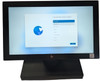 Front view of an HP Engage One Pro all-in-one touchscreen POS system on an expansion stand displaying the Windows 11 setup screen with an Intel Core i5 badge.